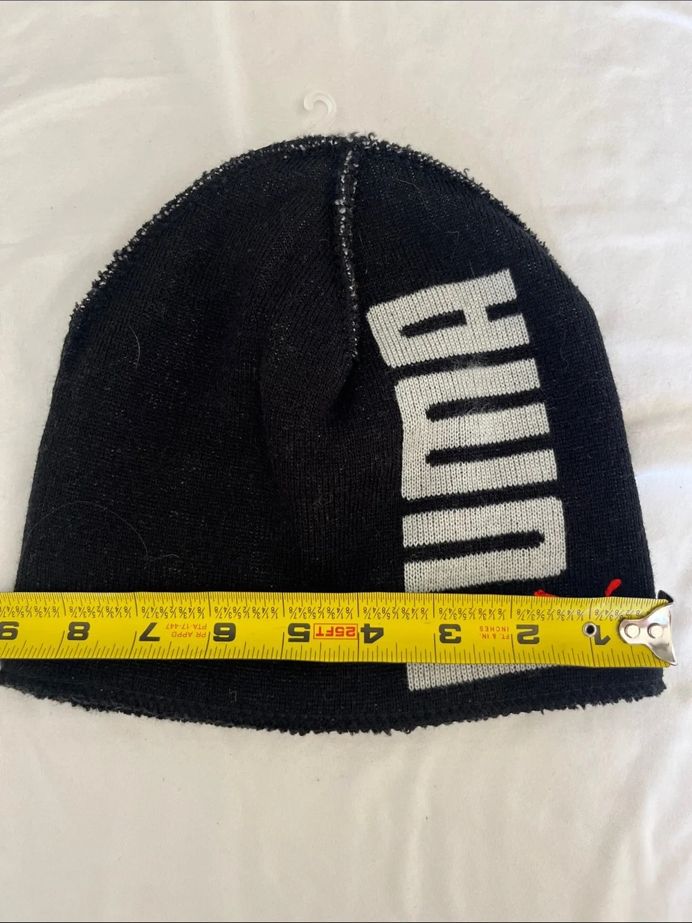 Puma Kids Black Beanie with White Branding and Red Puma Logo